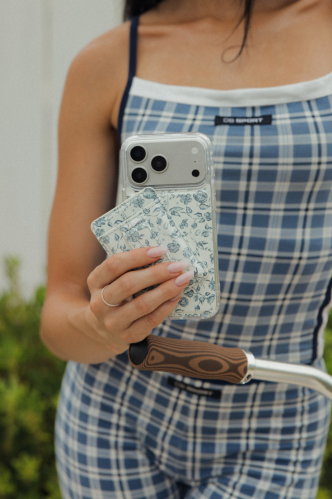 Floral magnetic phone wallet with card slots and magnetic tab closure