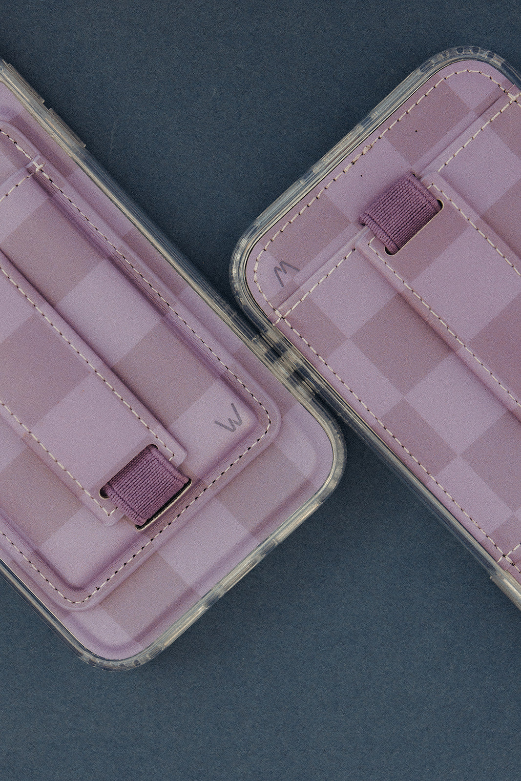 Lilac magnetic phone wallet interior with card compartments and stitched details.