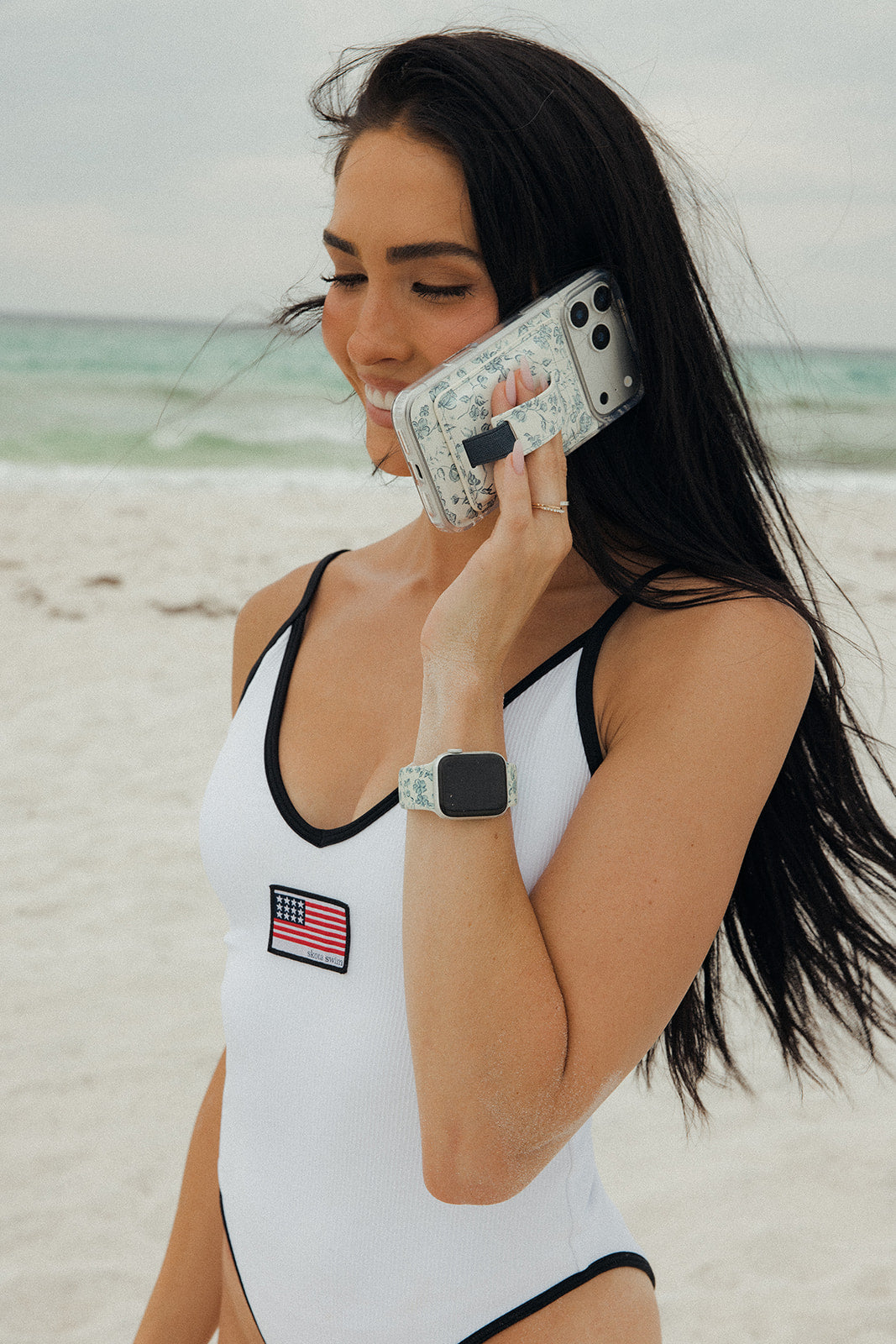 Floral magnetic phone wallet worn with magnetic strap and dark tab