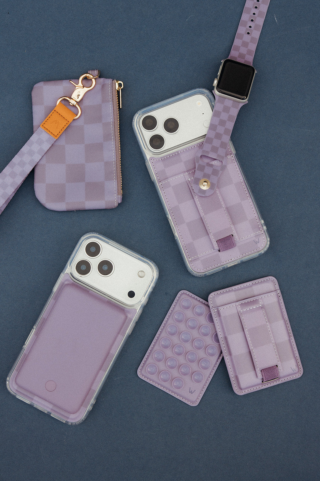 Purple checkered zipper pouch with wrist strap and key ring hardware