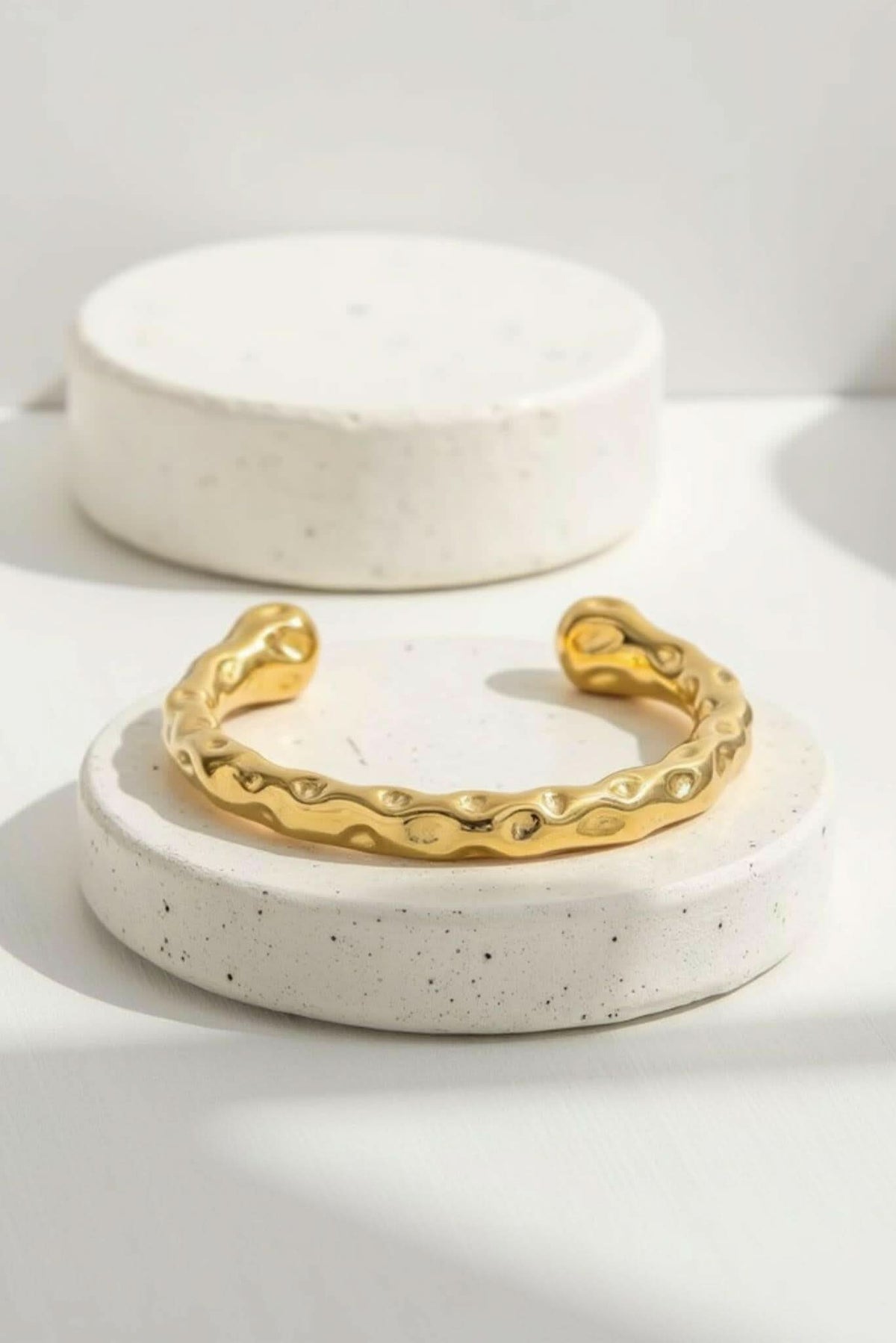 Gold textured cuff bracelet with sculpted wavy links