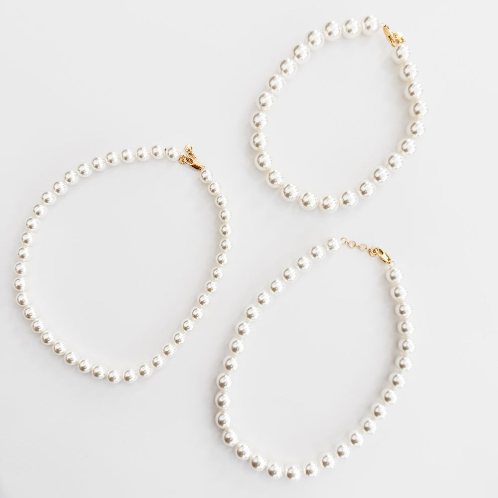 Pearl necklace set of three teardrop loops, white pearls with gold-tone end caps