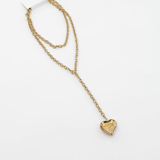 Gold-tone layered wrapped necklace with heart pendant and chain links