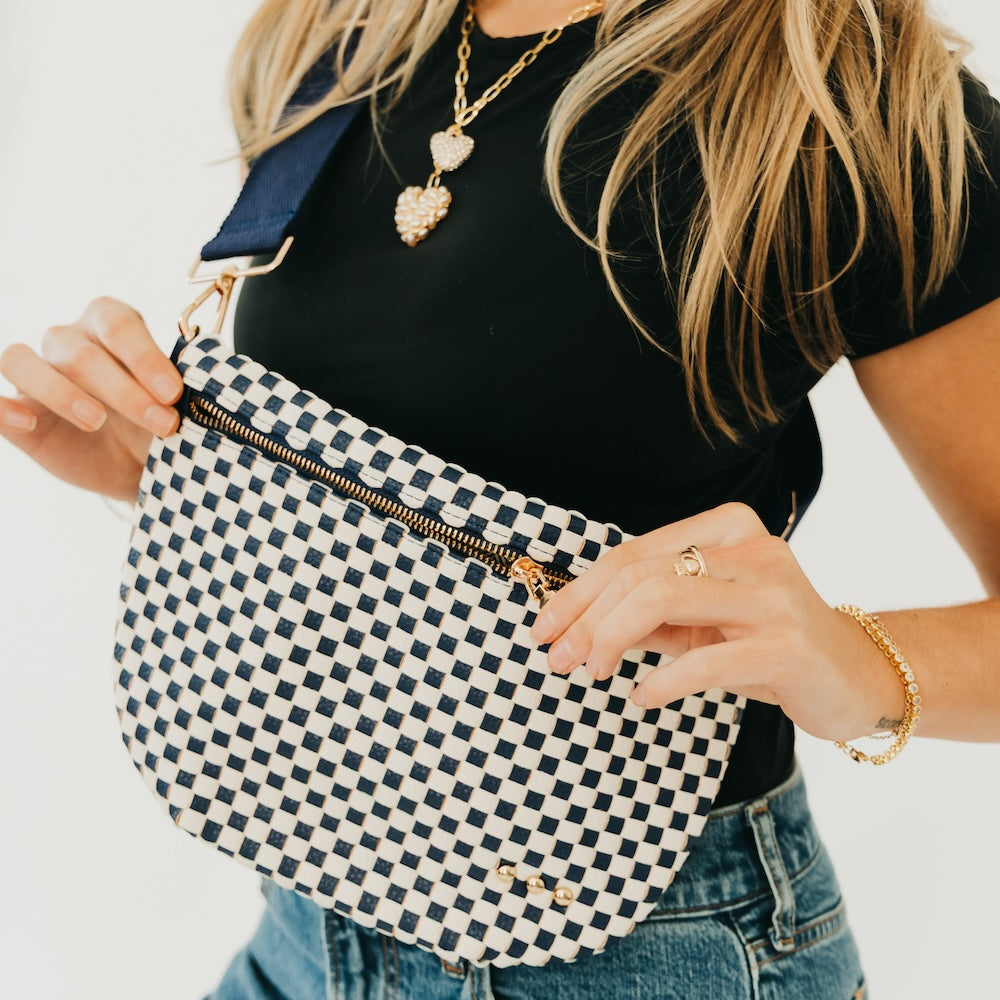 Black-and-white checkered woven bum bag with zipper