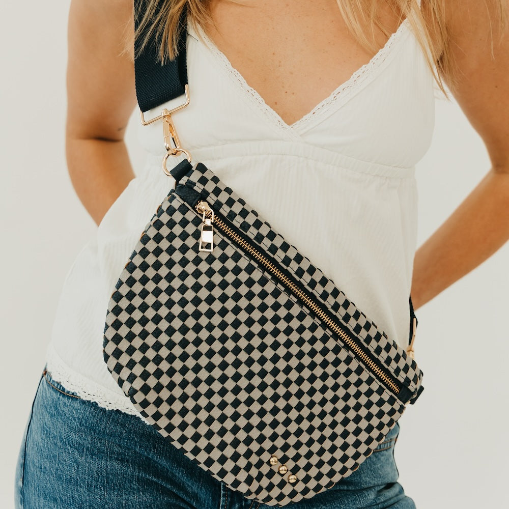 Westlyn woven bum bag, black-and-cream checkered with gold zipper and belt-style strap