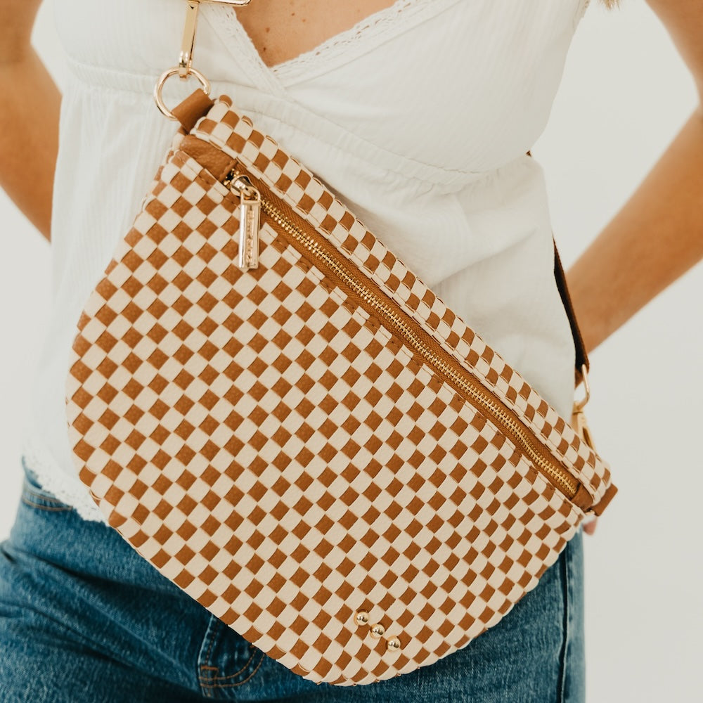 Tan-and-brown checkered woven bum bag with gold zipper and adjustable strap