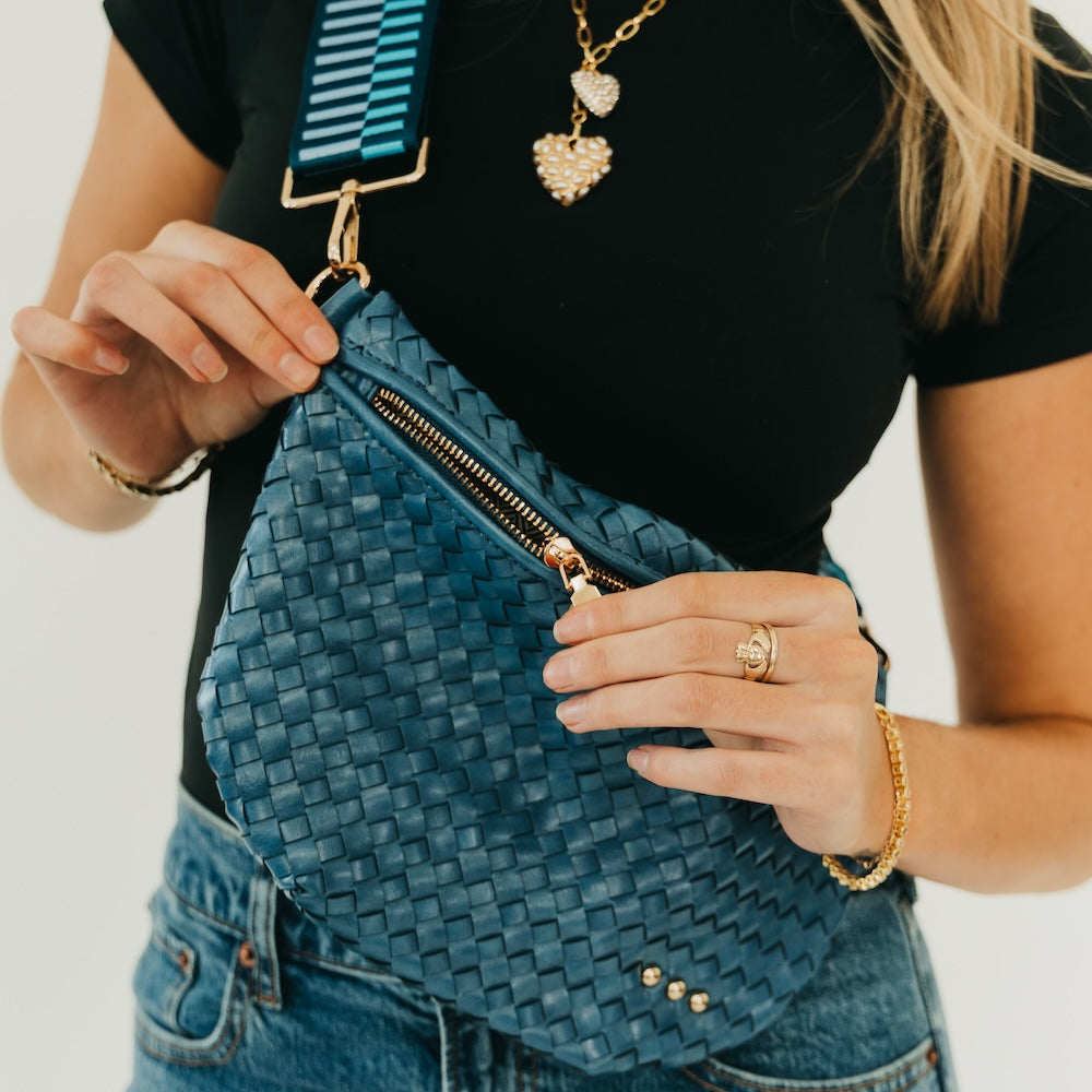Westlyn woven bum bag, teal blue basket-weave texture with gold zipper and hardware