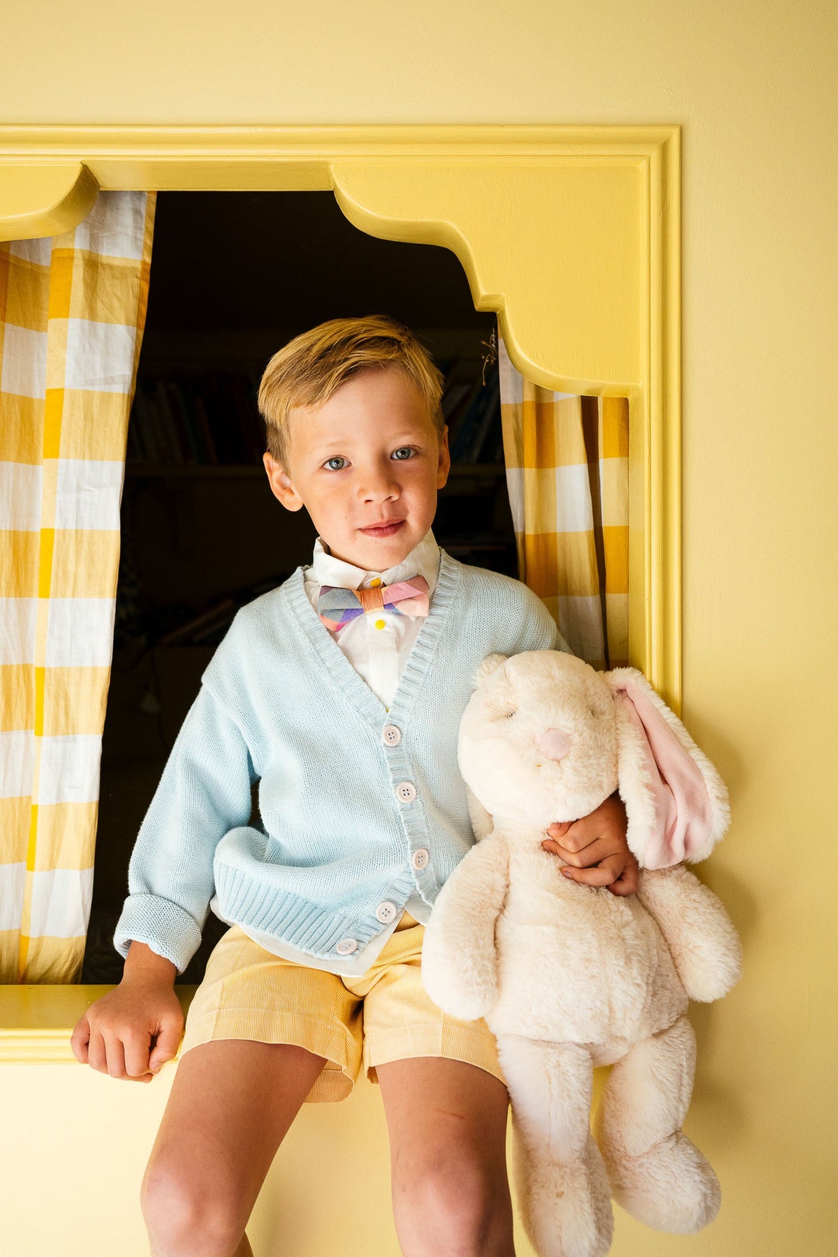 Plaid bow tie on boy’s shirt, pastel check pattern with neck tie band