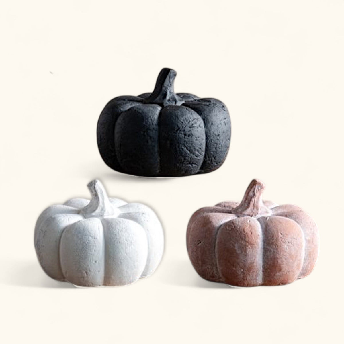Set of three small decorative pumpkins in dark, white, and blush colors