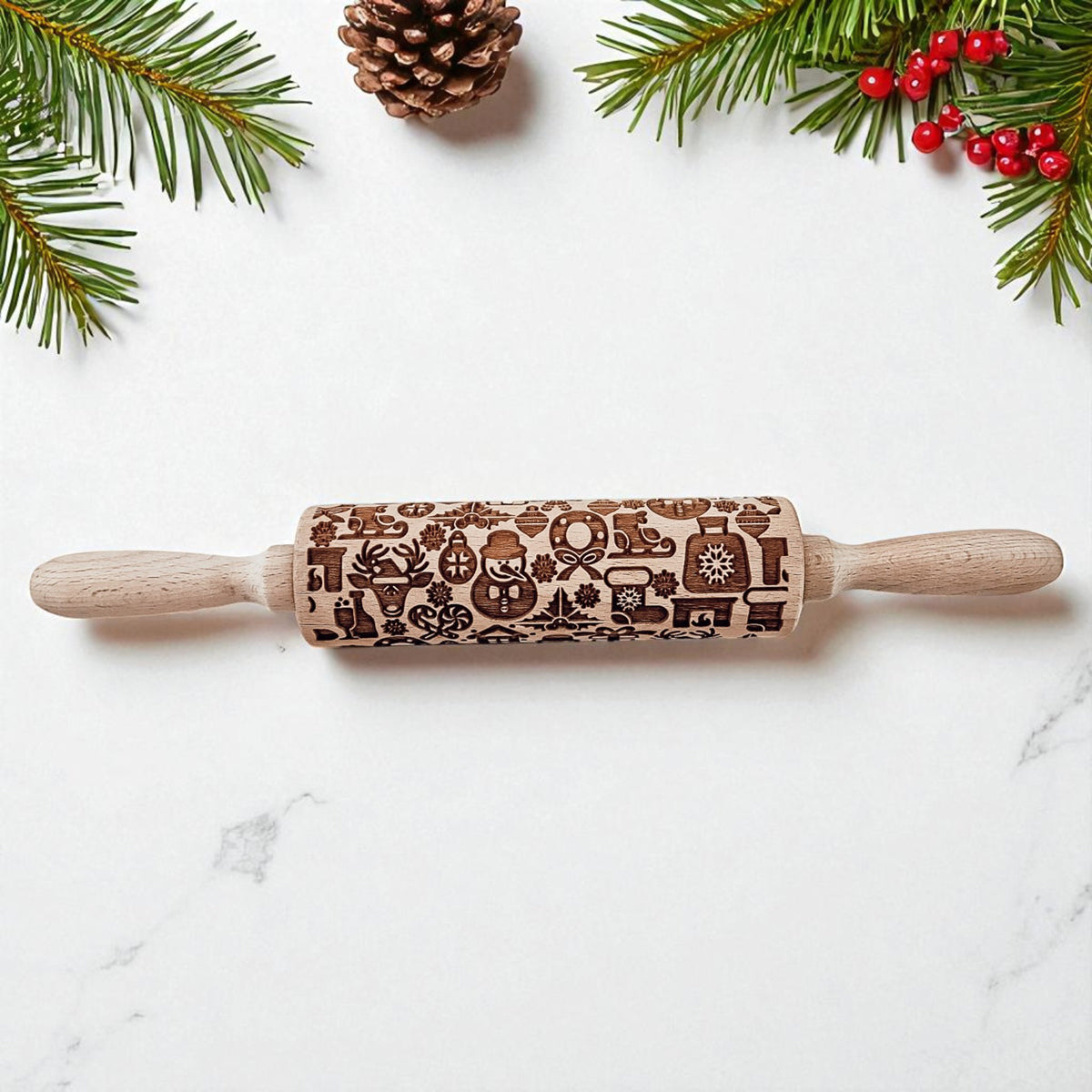 Christmas rolling pin with decorative embossed holiday motifs on a light wood handle