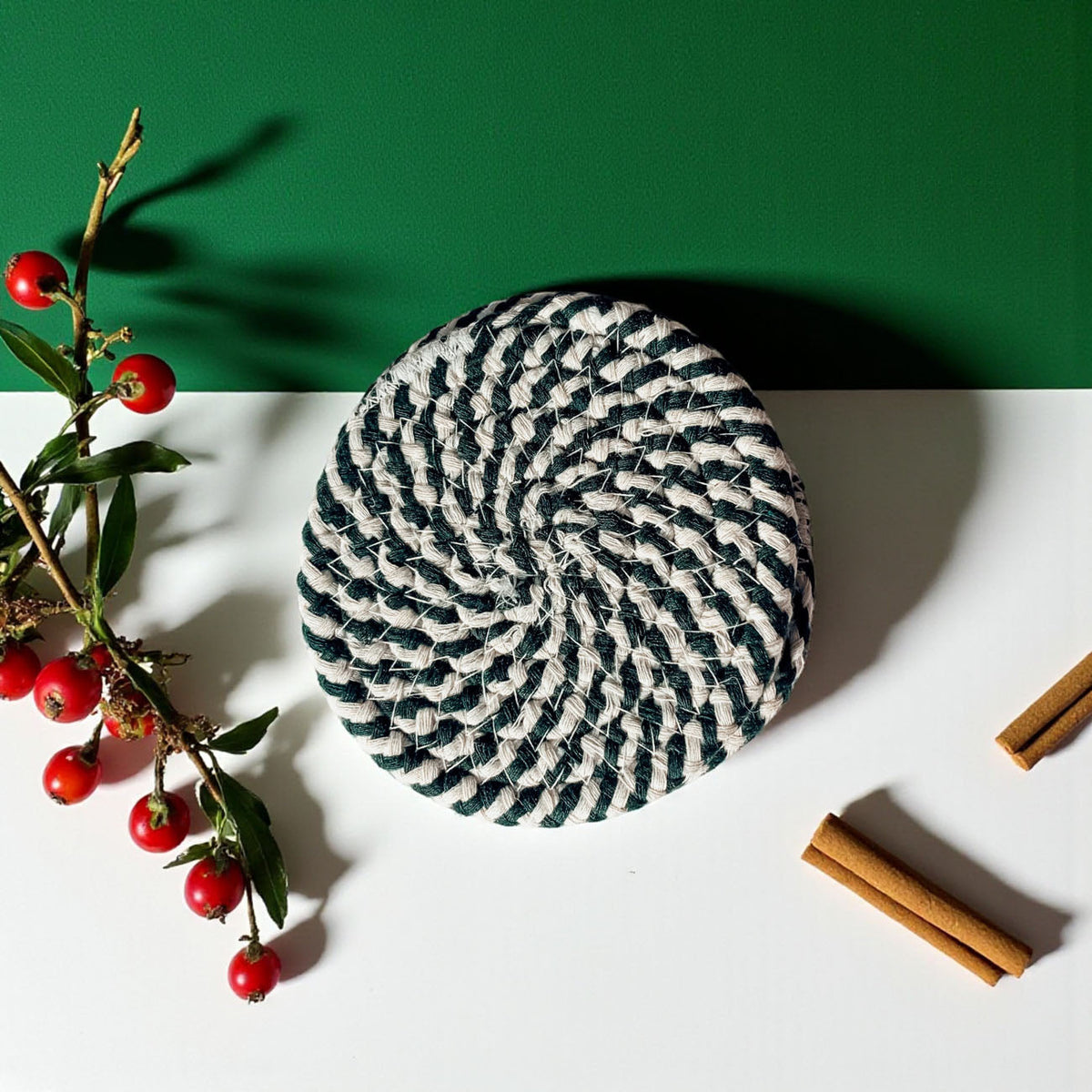 Coaster set (4-pack) featuring a round navy-and-white striped coaster