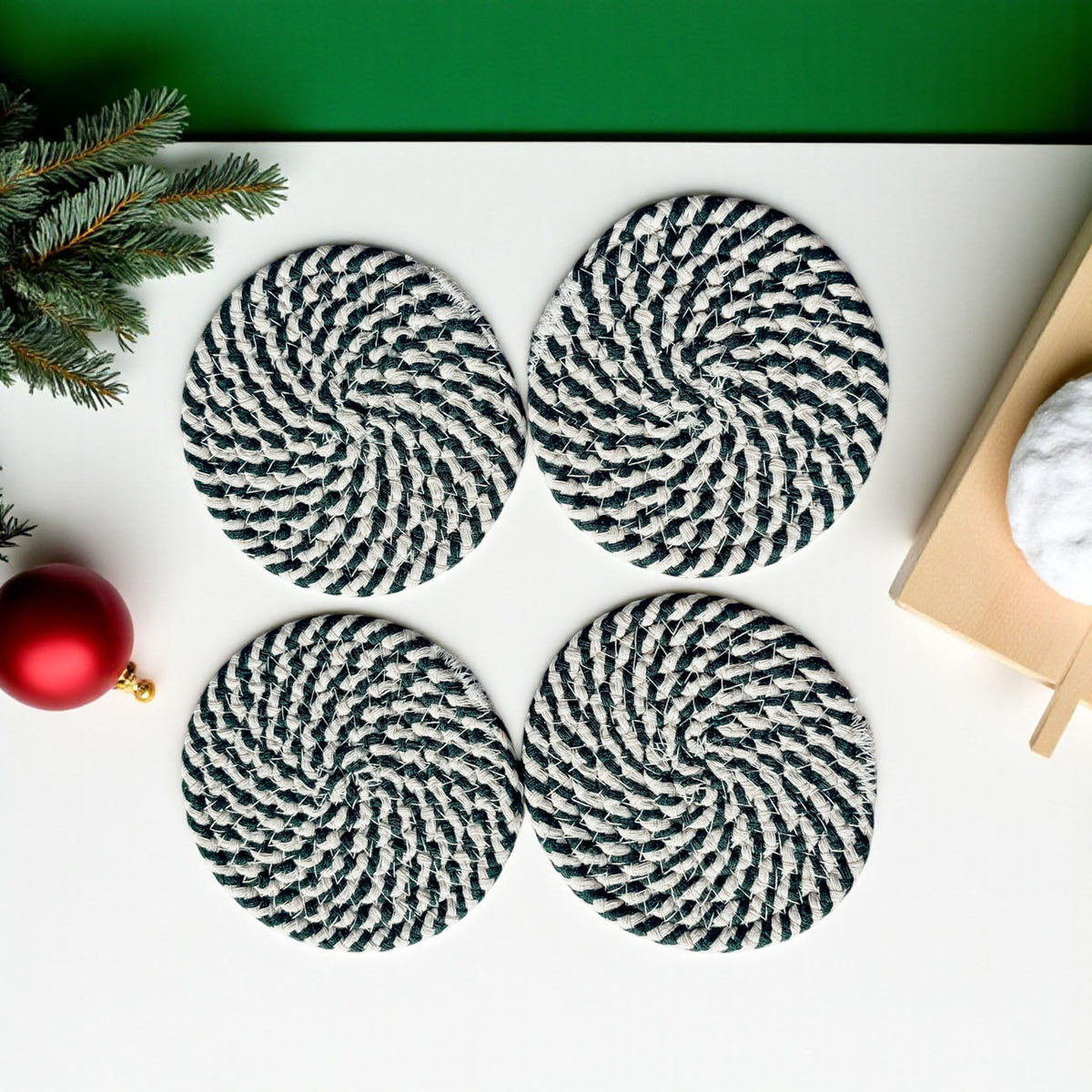 Coaster set (4-pack) showing four round navy-and-white striped coasters