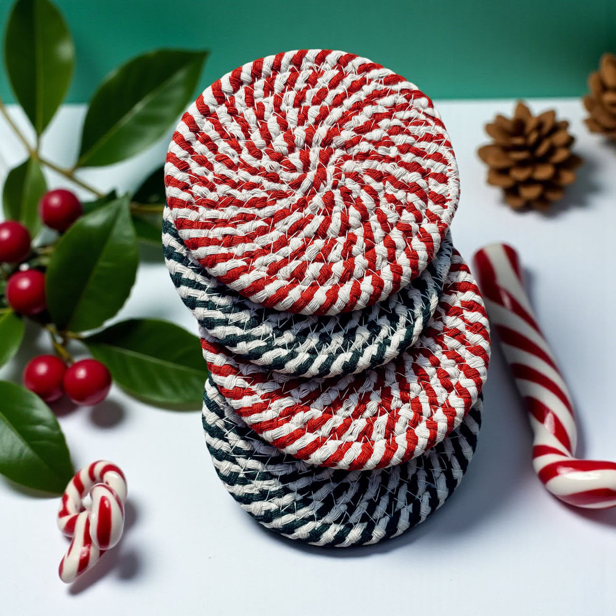 Coaster set (4-pack) of round red-and-white striped coasters, stacked