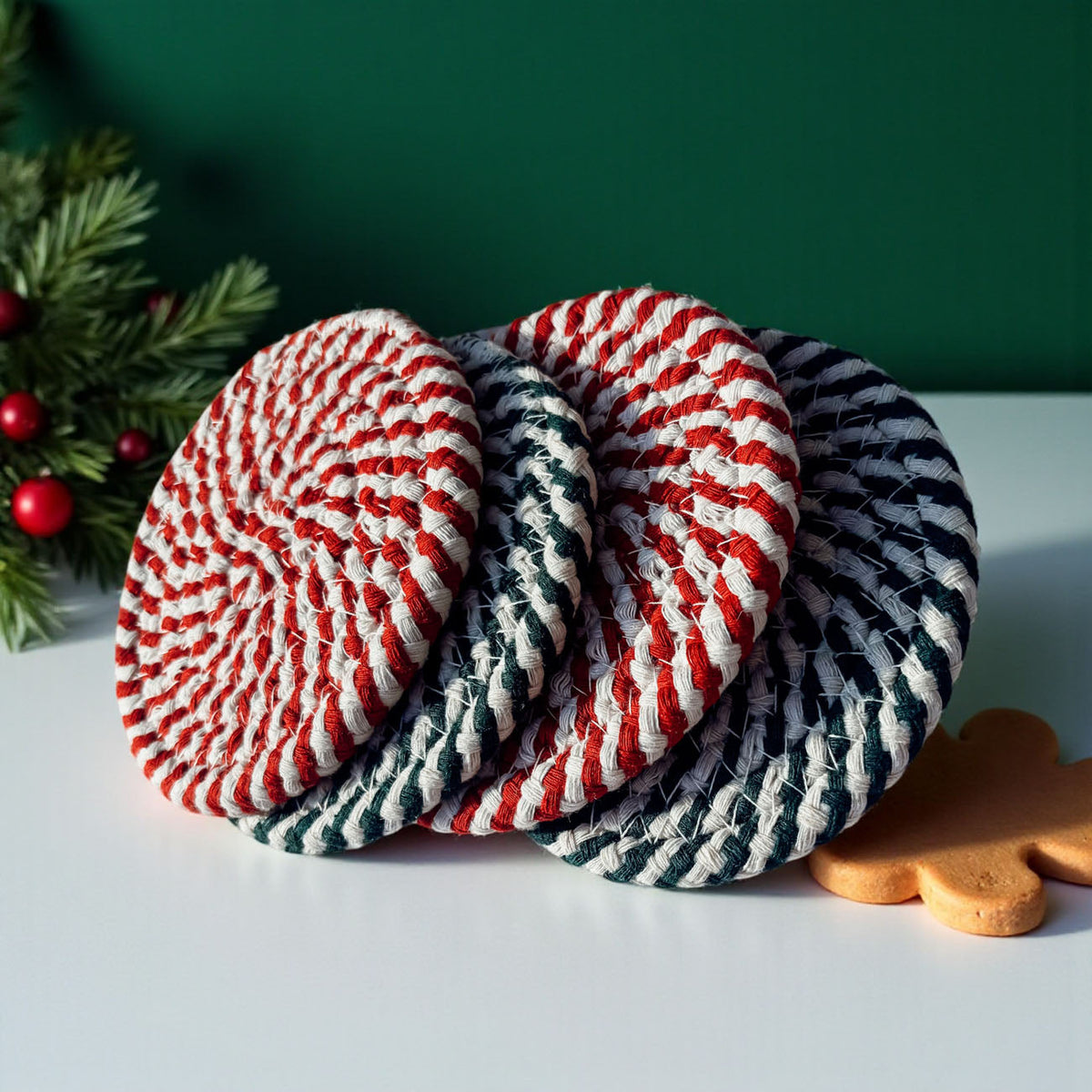 Assorted striped braided coasters, red/white and navy/teal, holiday display