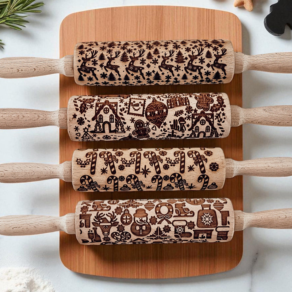Christmas rolling pin set with four light wood rollers and dark Christmas designs.