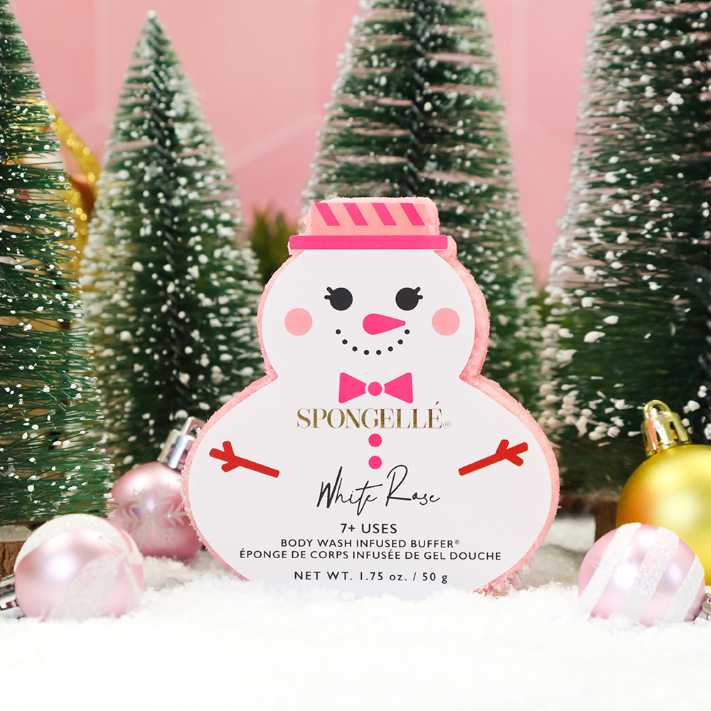 Snowman-shaped body buffer in white and pink with striped hat and bow