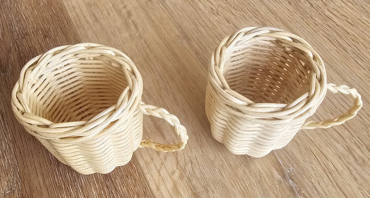Pair of natural wicker toy teacups with loop handles