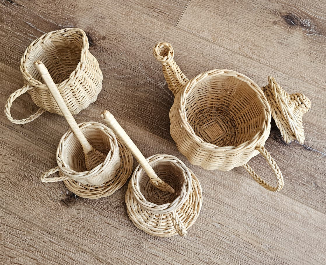 Woven tea set pieces including teapot, cups, lid, and spoons