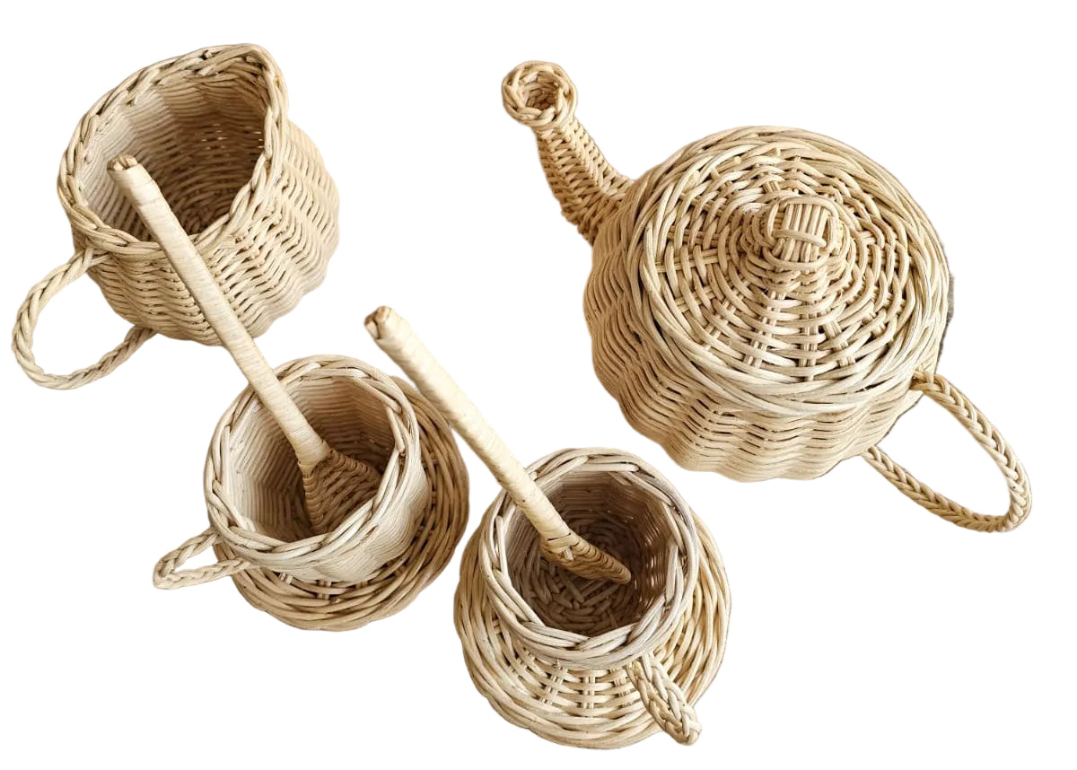 Wicker tea party play set with lidded teapot, three cups, saucers and stirrers