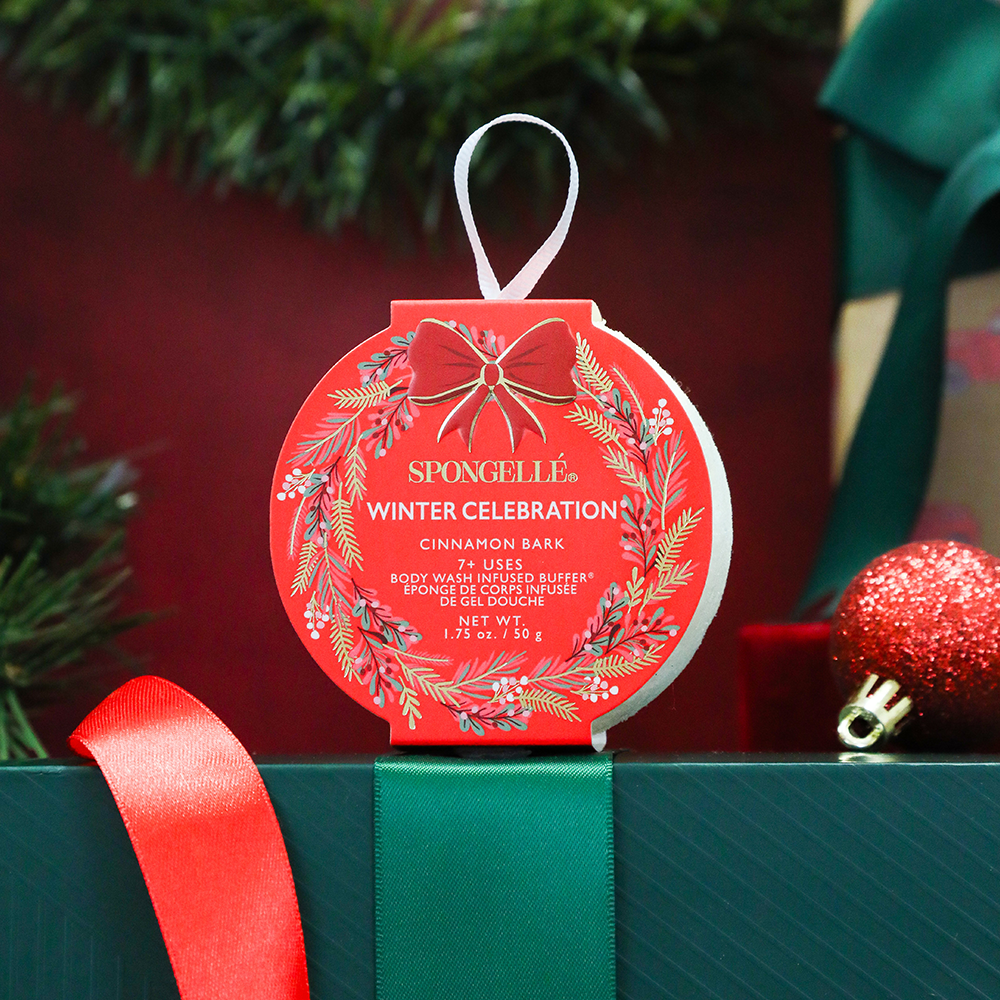 Red hanging holiday body buffer with ribbon, cinnamon bark scent