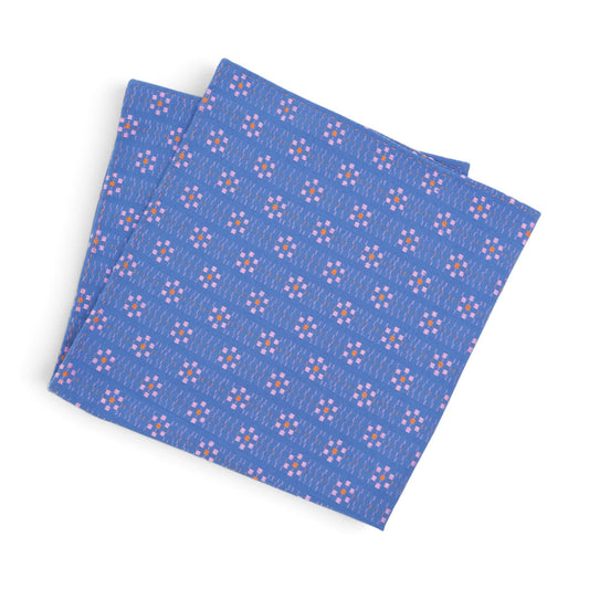 Blue patterned square bandana with repeating diamond motifs