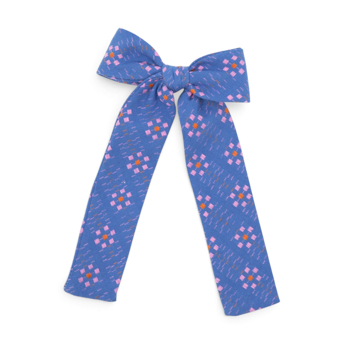 Blue geometric-pattern fabric hair bow with knotted center and long ribbon tails