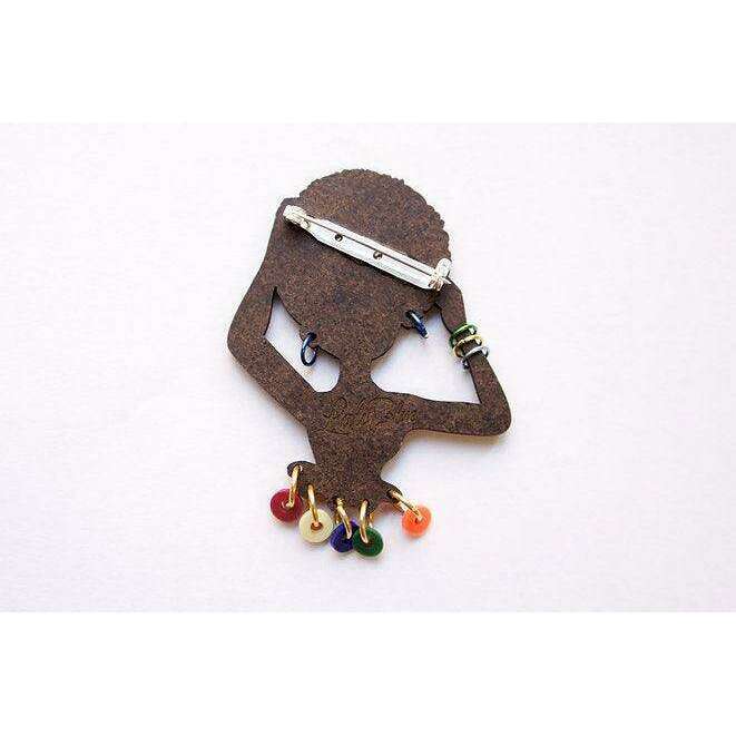 African woman brooch back view with safety pin clasp and bead dangles