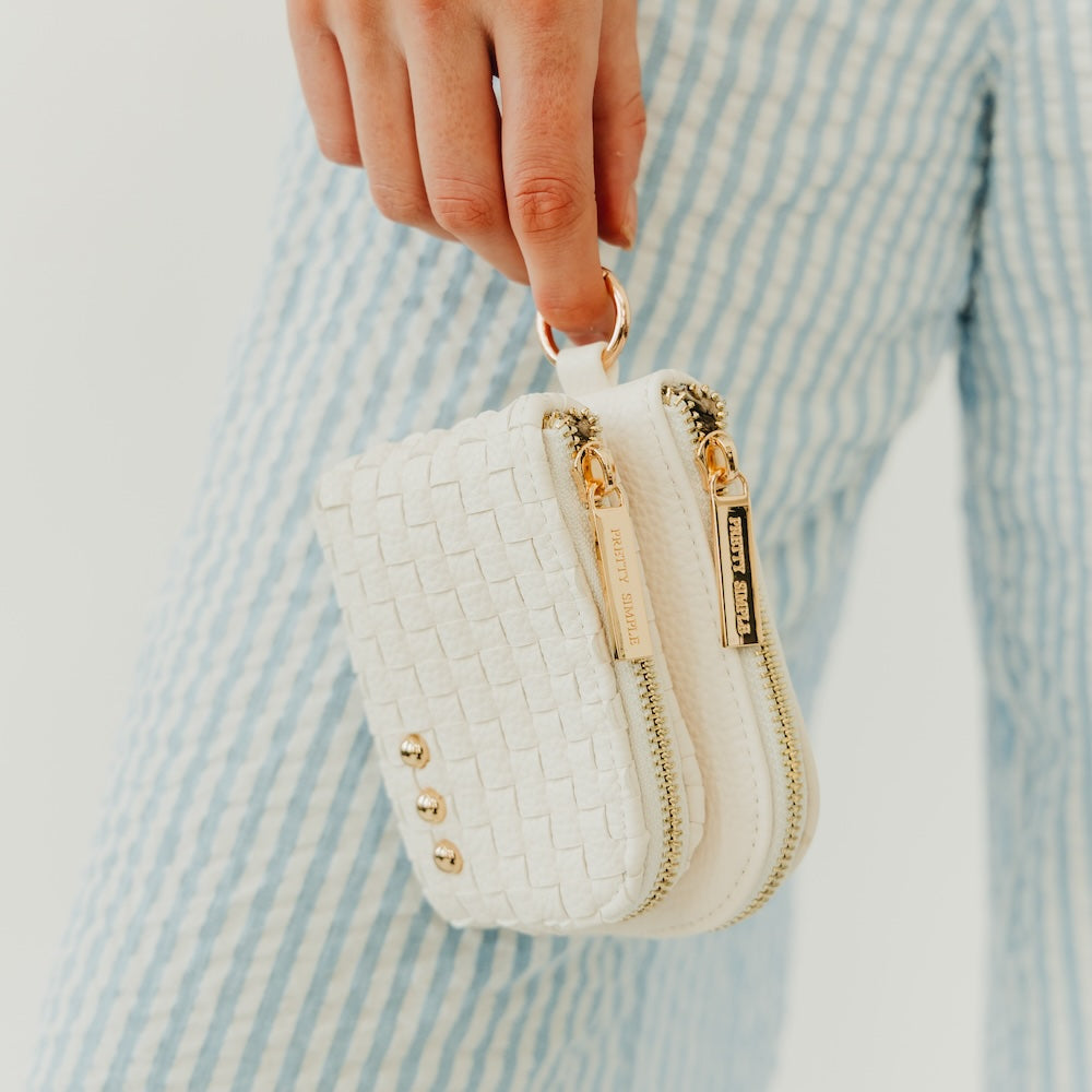 Woven double-zip clippable card wallet, cream woven texture with gold zipper pulls