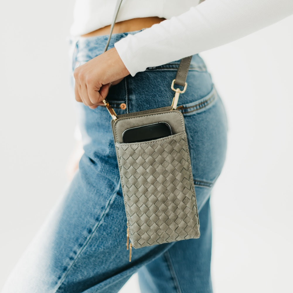 Woven phone bag in gray with crossbody strap and rectangular zipper pocket
