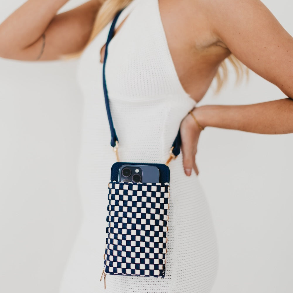 Woven double-duty phone bag with navy and white checkered front