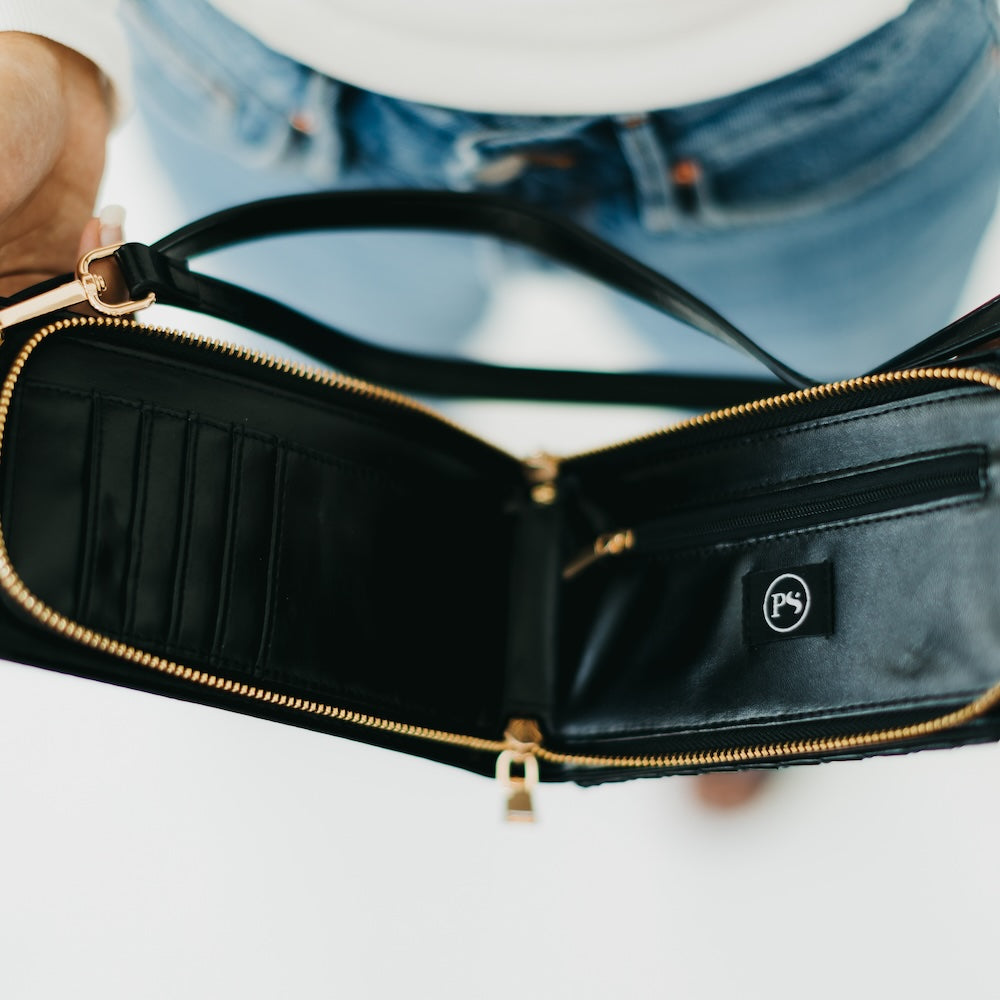 Black woven phone bag with gold-tone zipper and open top pocket detail