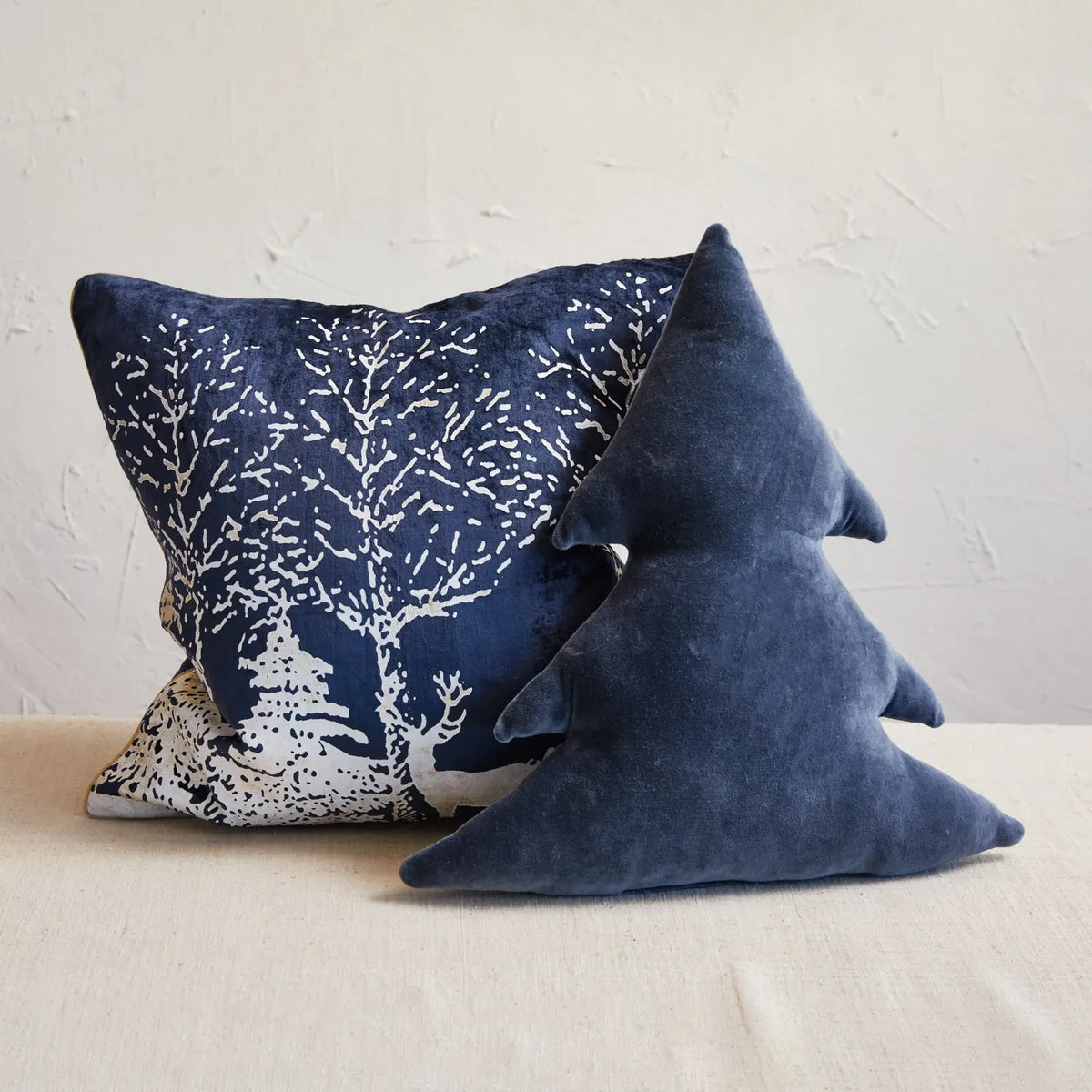 Navy tree-shaped velvet cotton pillow with stitched branch nubs