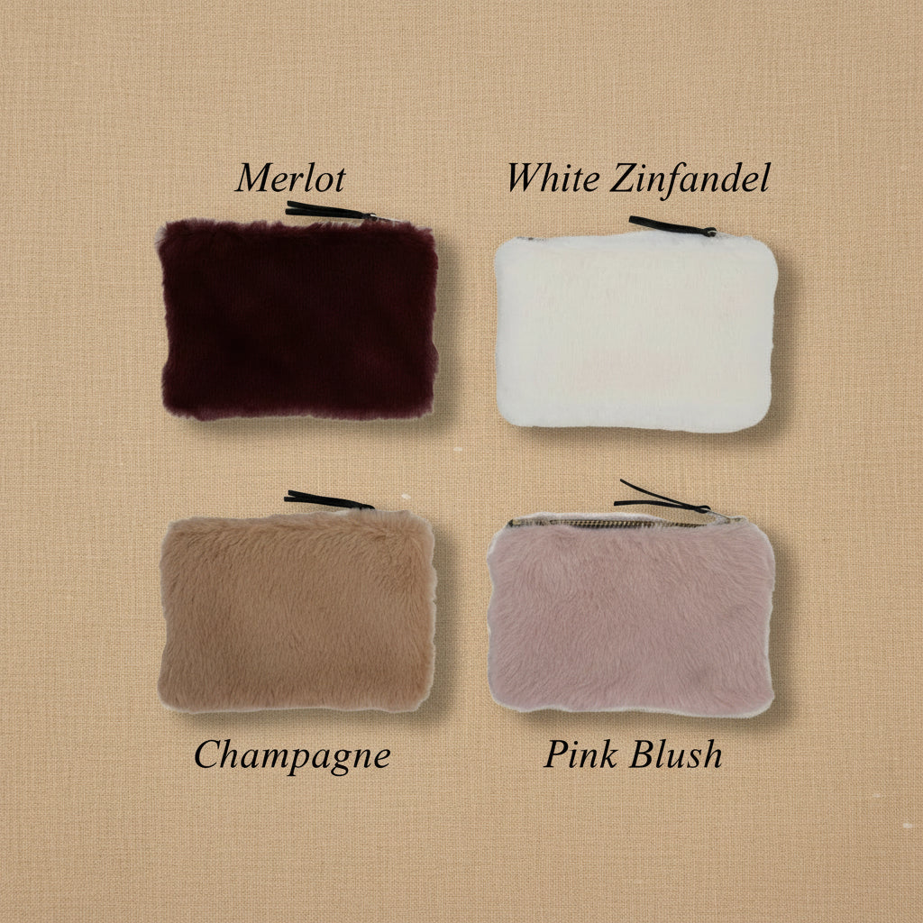 Four faux fur zip pouches in burgundy, white, tan, and pale pink