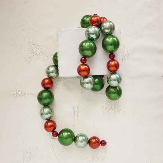 Green and red plastic ball garland with metallic balls, circular wreath shape