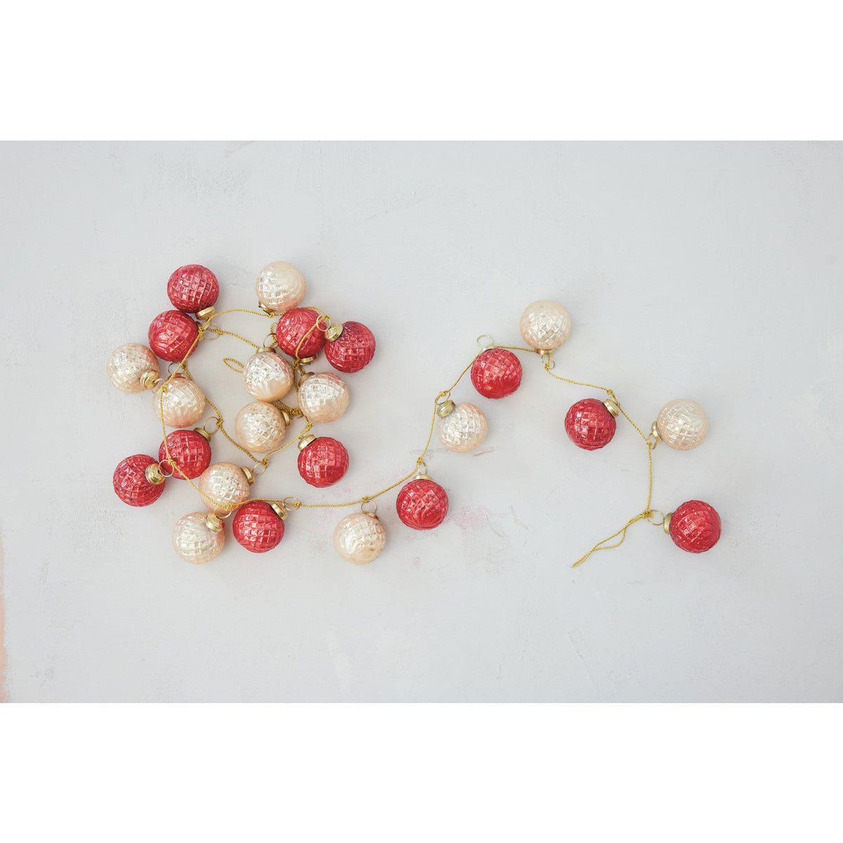 Mercury glass ball ornament garland with red and champagne gold baubles