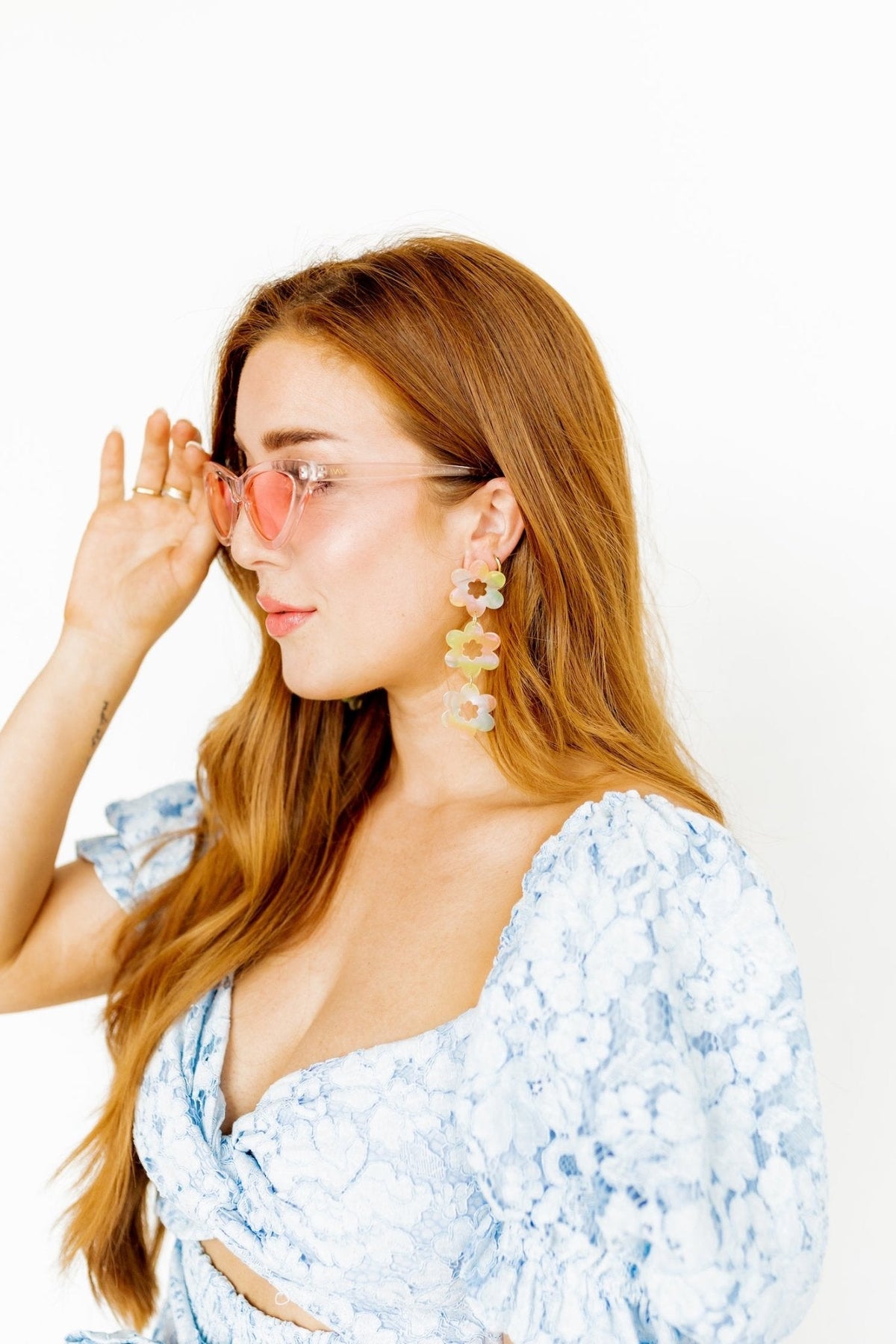 Long drop floral earrings with three-tier pastel blossoms and hoop backing